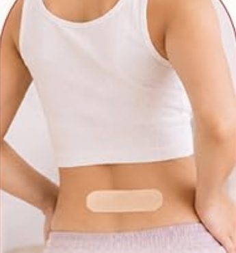 Applying the FLO patch to the lower back